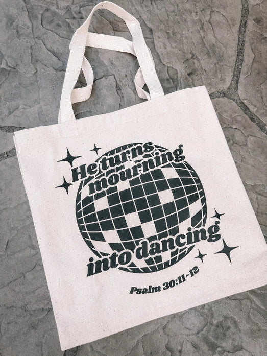 He Turns Mourning Into Dancing Tote Bag